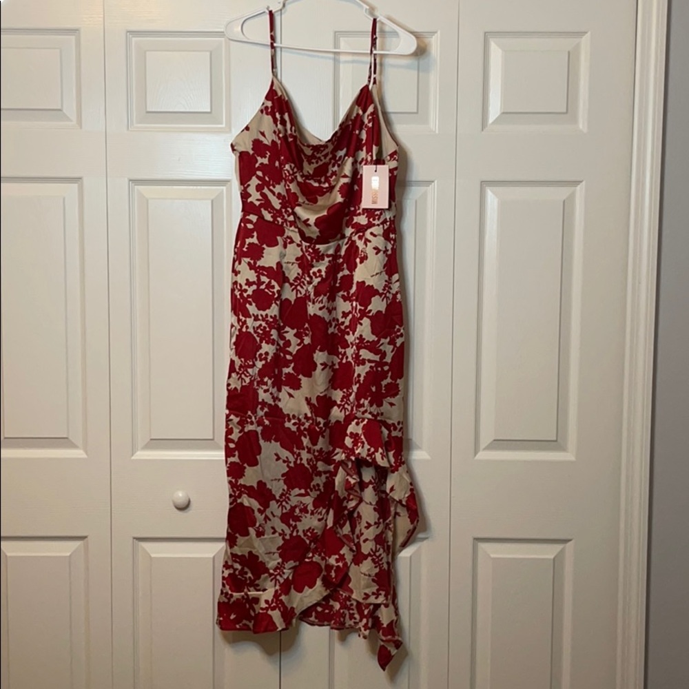 This beautiful dress is too big for me.
